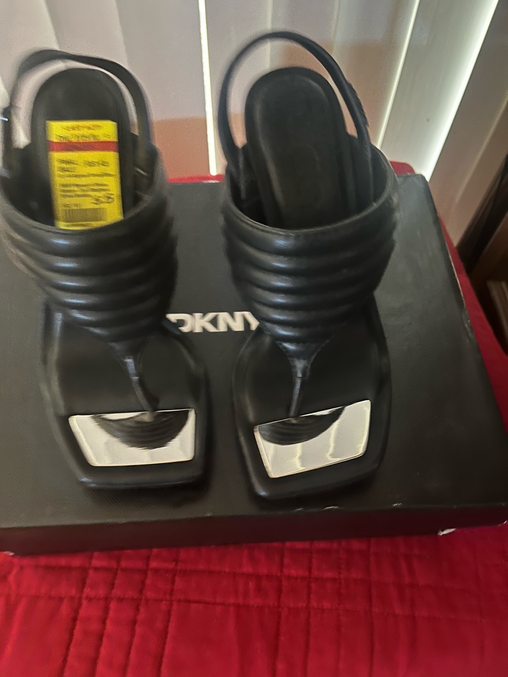 DKNY Black Thong Sandals with Silver Toe Accent